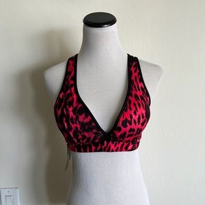 Woman’s sports bra size medium large leopard orange red pink sun